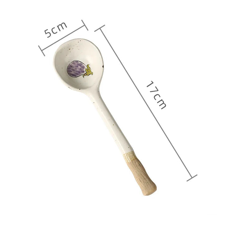 A white ceramic kawaii spoon with measurements