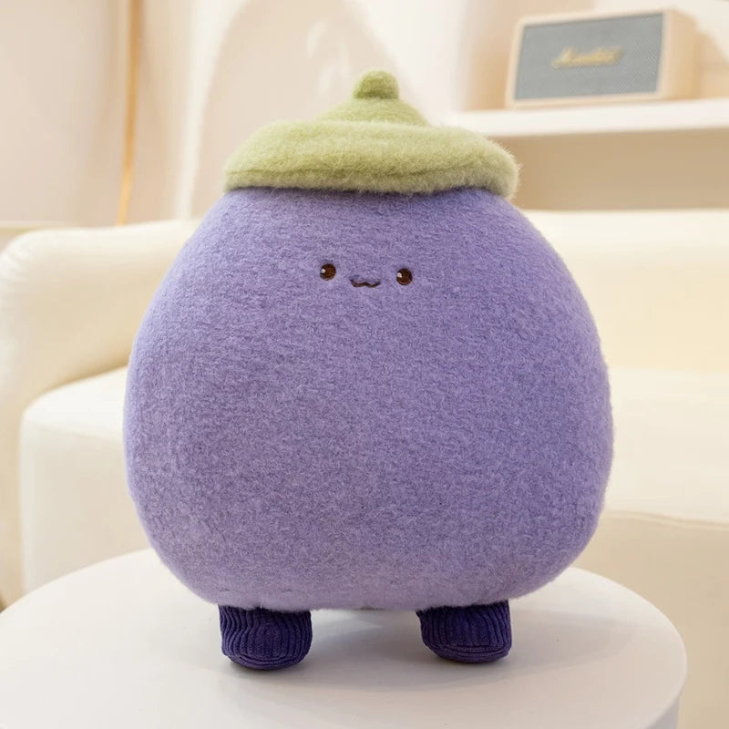 Purple kawaii plush toy with a green hat on a white surface