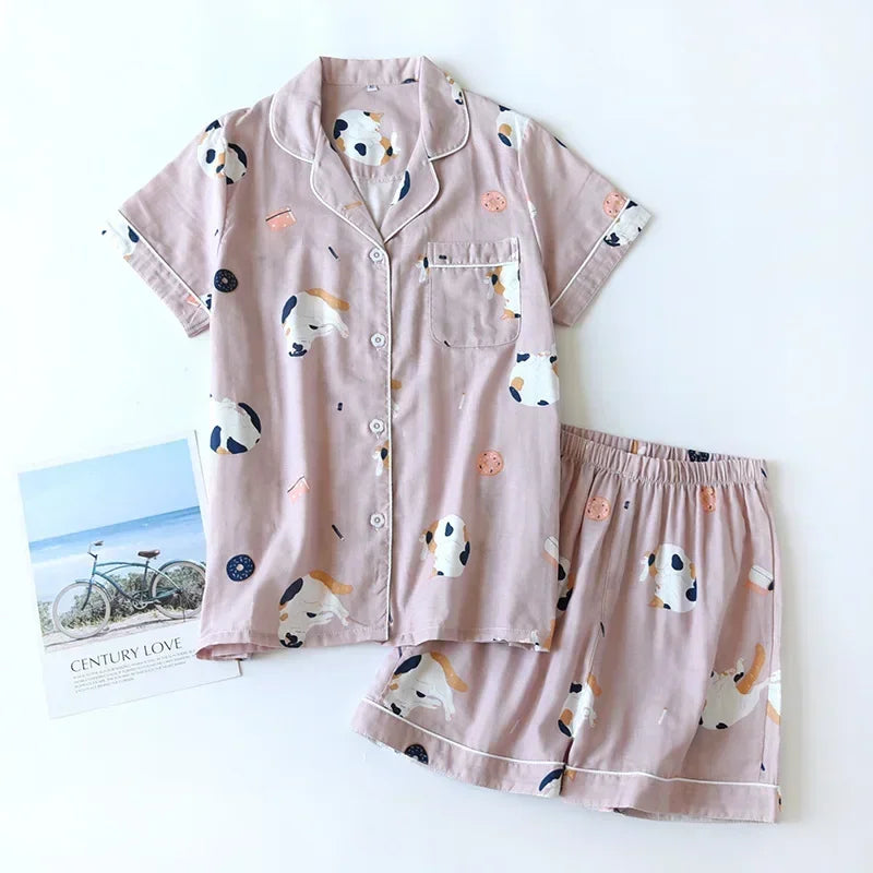 Pink pajama set with dog kawaii pattern on a white background
