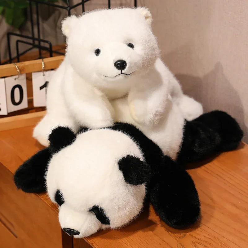 Two kawaii plush toys, one white bear and one black and white panda, on a wooden surface.