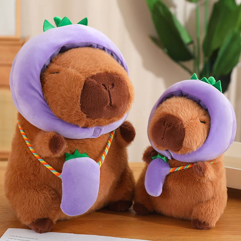 Two brown kawaii plush toys with purple hats on a wooden surface.
