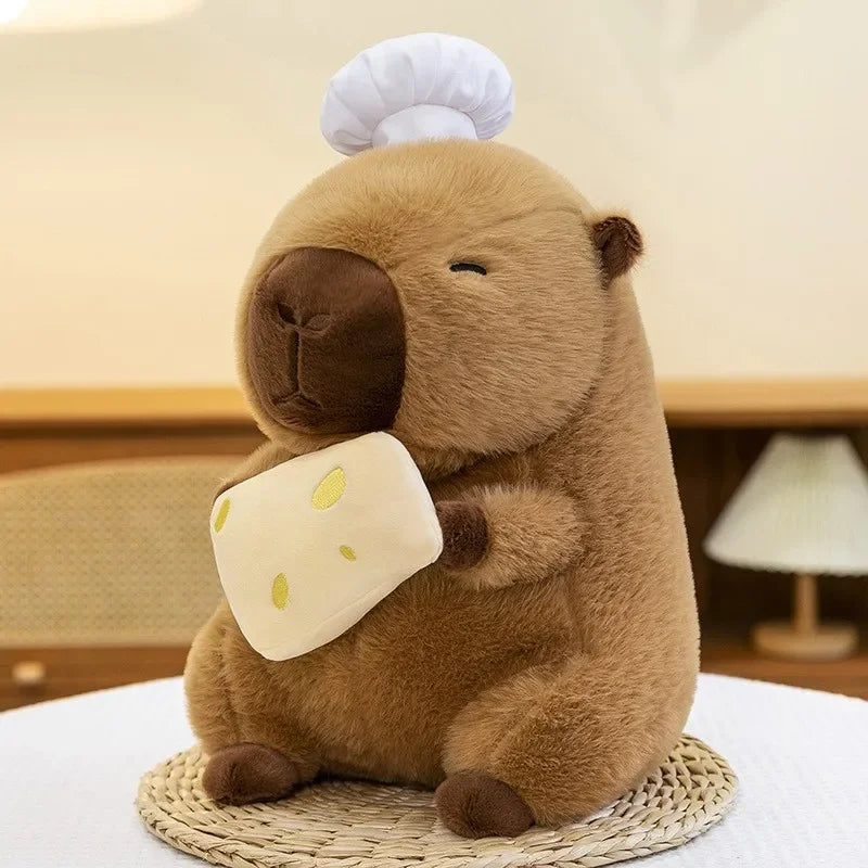 Kawaii plush toy groundhog holding a mushroom and piece of cheese on a light background