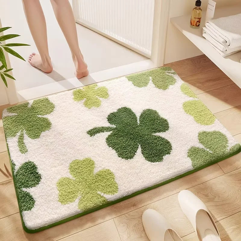 Green four-leaf clover kawaii rug on a wooden floor with a person stepping onto it.