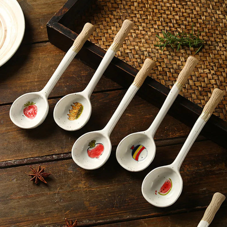 A set of five kawaii spoons of different designs on the table