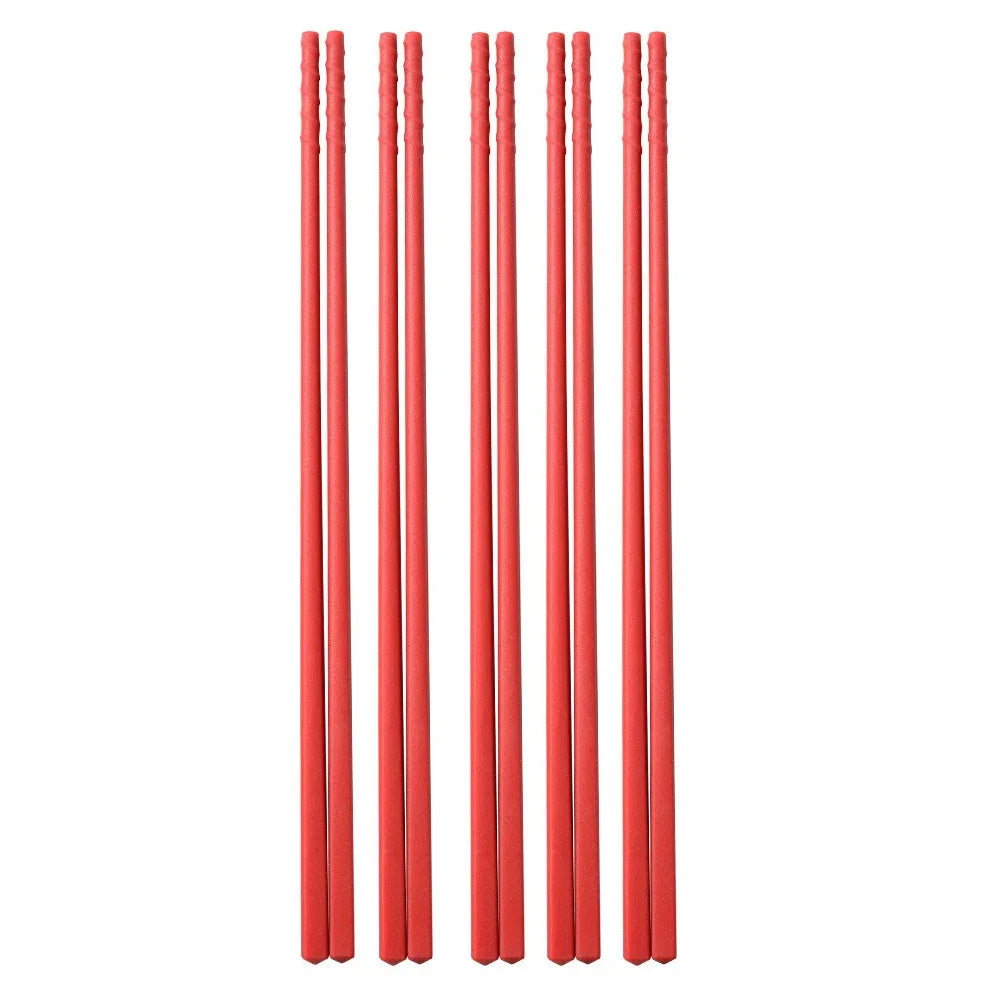 Set of red kawaii chopsticks on a white background
