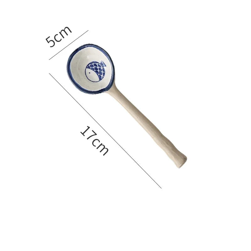 A fish designed kawaii spoon on a white background