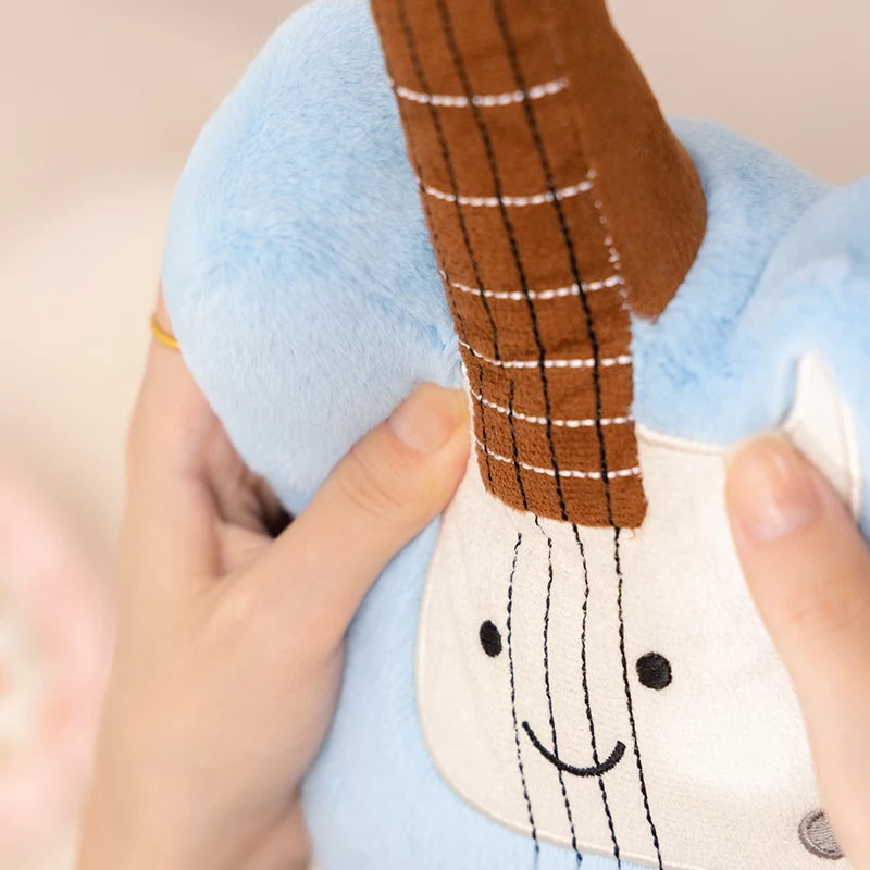 Close-up of a kawaii plush toy with a face on a light background