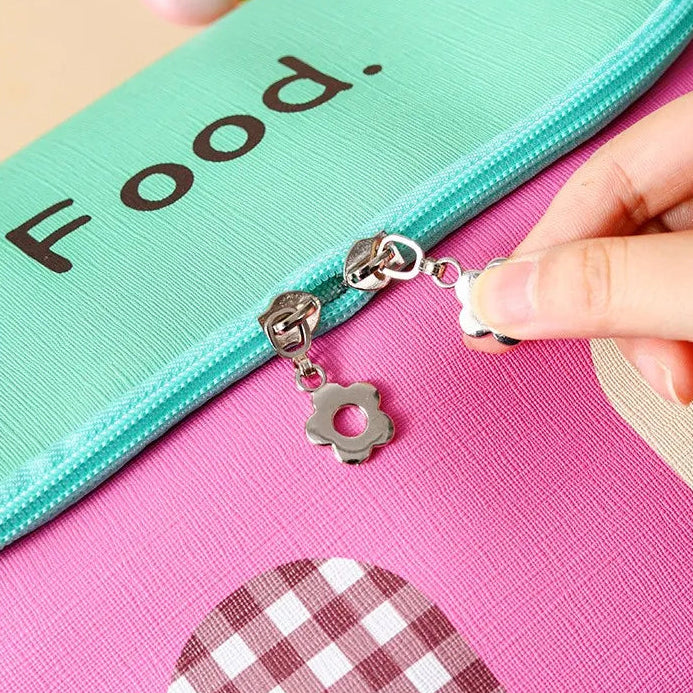 Kawaii lunch bag with double zipper design on a pink background