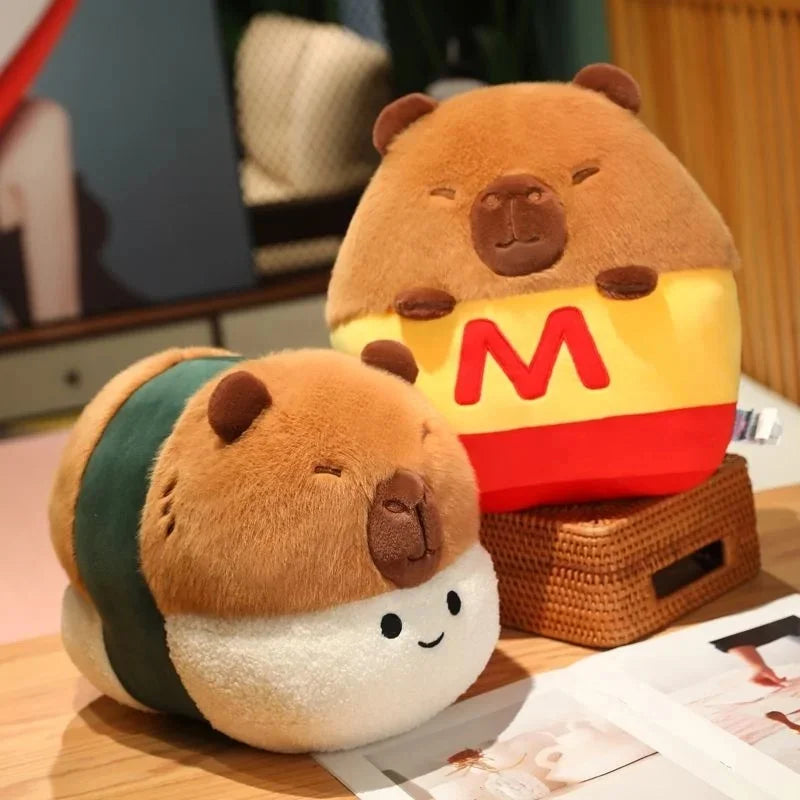 Two kawaii plush toys resembling bear and fish with a red 'M' on a table.