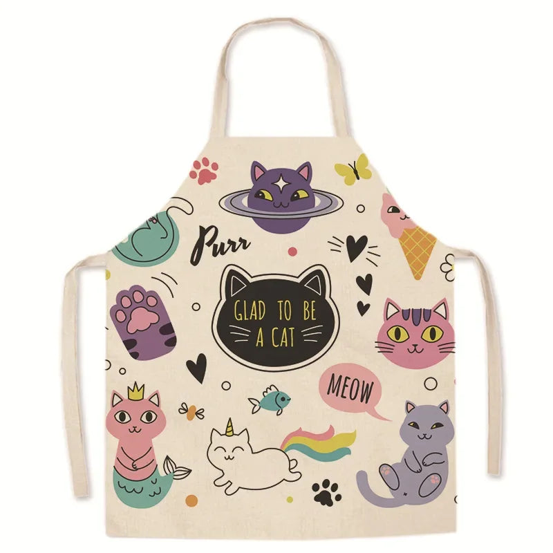 Children's kawaii apron with cat-themed designs on a white background