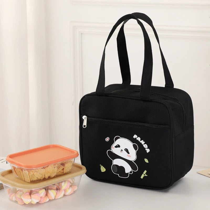 Black insulated kawaii lunch bag with a panda design on a white surface