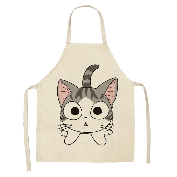 Beige kawaii apron with a cartoon cat design on a white background