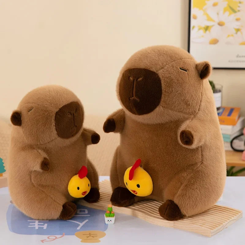 Two kawaii plush toys resembling bears with small yellow birds on a table.