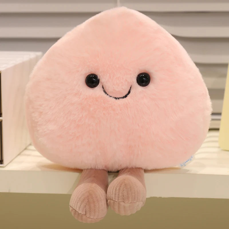 Pink kawaii plush toy with a smiley face on a shelf