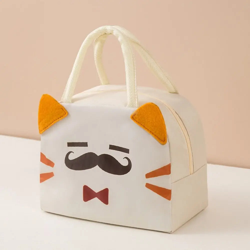 Cat-shaped kawaii lunch bag with a mustache and bow tie design on a beige background