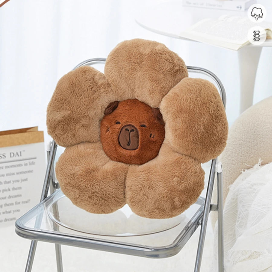 Floral-shaped kawaii cushion with a bear face design on a chair