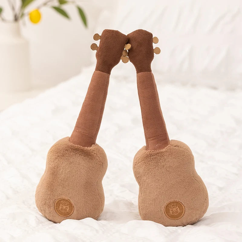 Two kawaii plush toy legs with arms raised in a heart shape on a white background