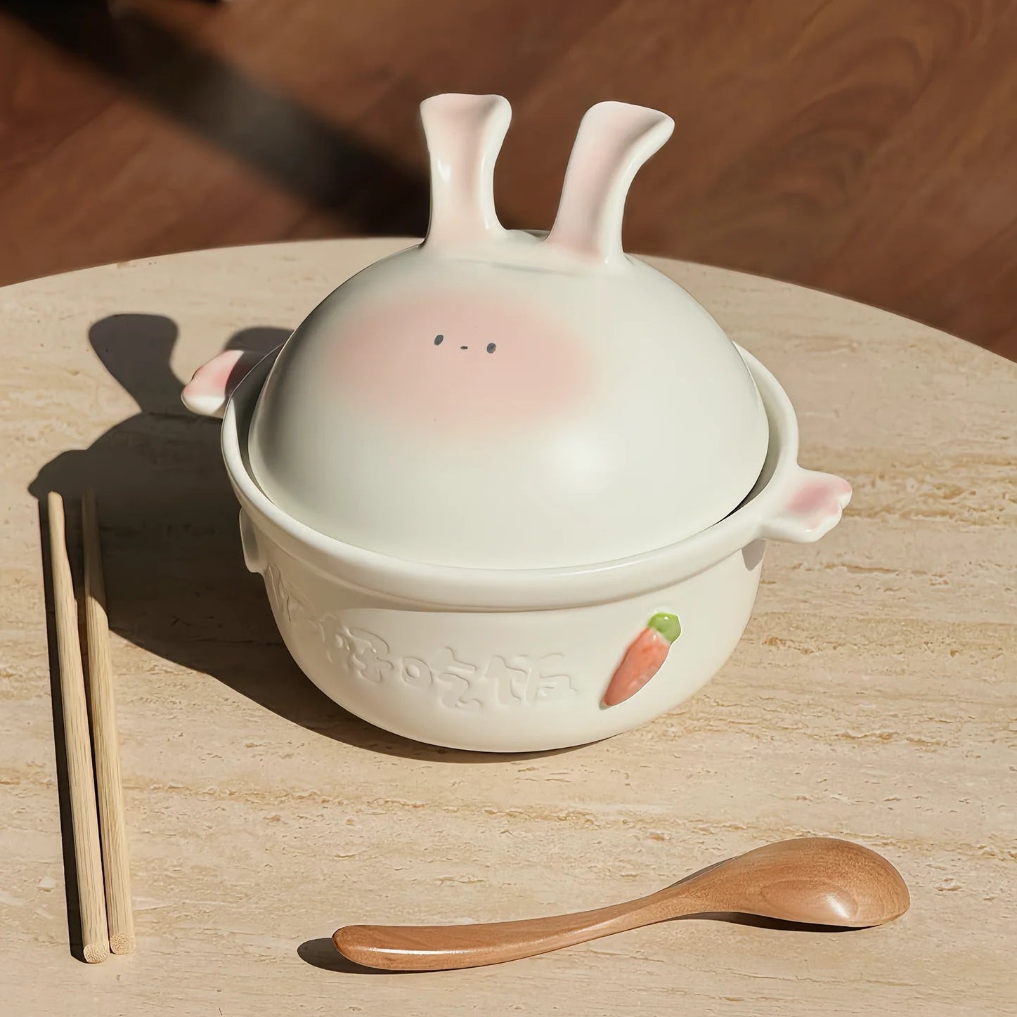 Cute ceramic kawaii bowl with rabbit design on a wooden surface, featuring the brand 'YUTOPIA'.