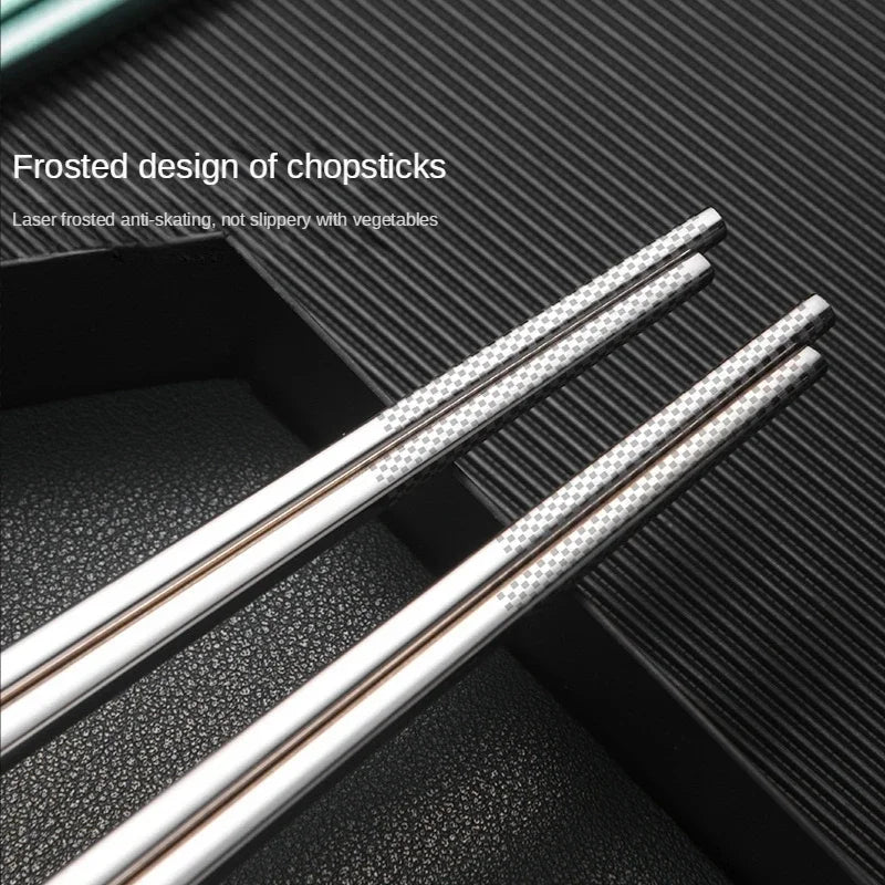 Frosted design of kawaii chopsticks on a textured black surface