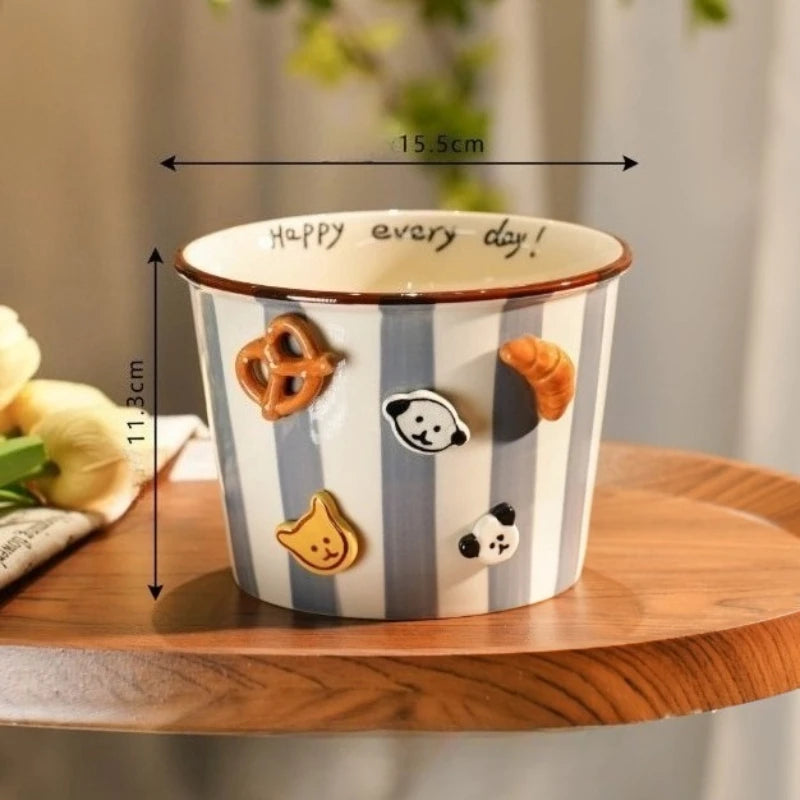 Decorative ceramic kawaii ramen bowl with cartoon character stickers on a wooden surface