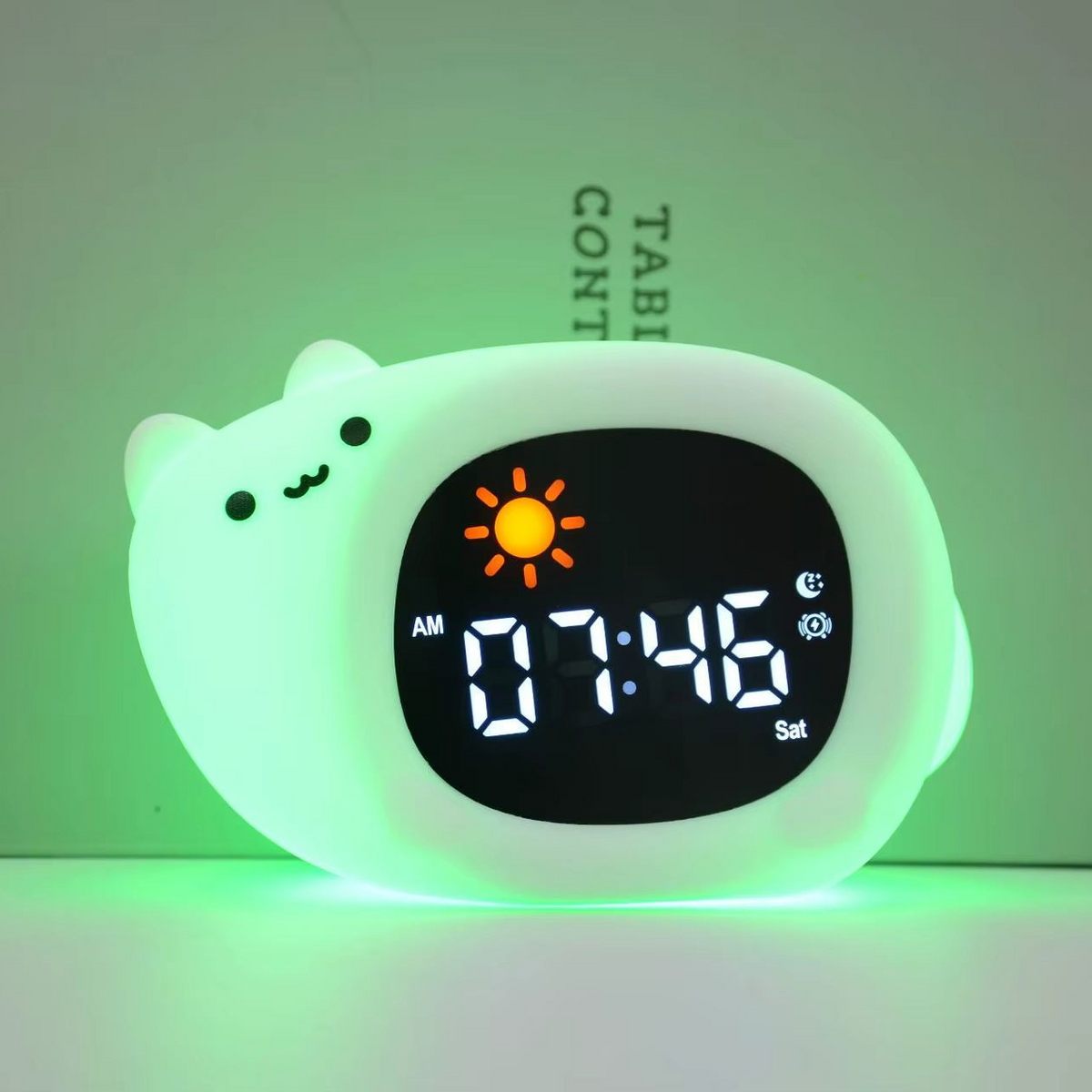 White cat-shaped digital clock with green glow on a white background