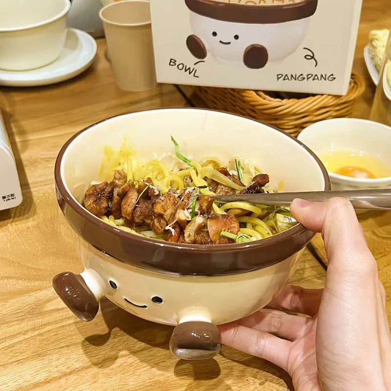 Cute cartoon-style kawaii bowl with food on a wooden table
