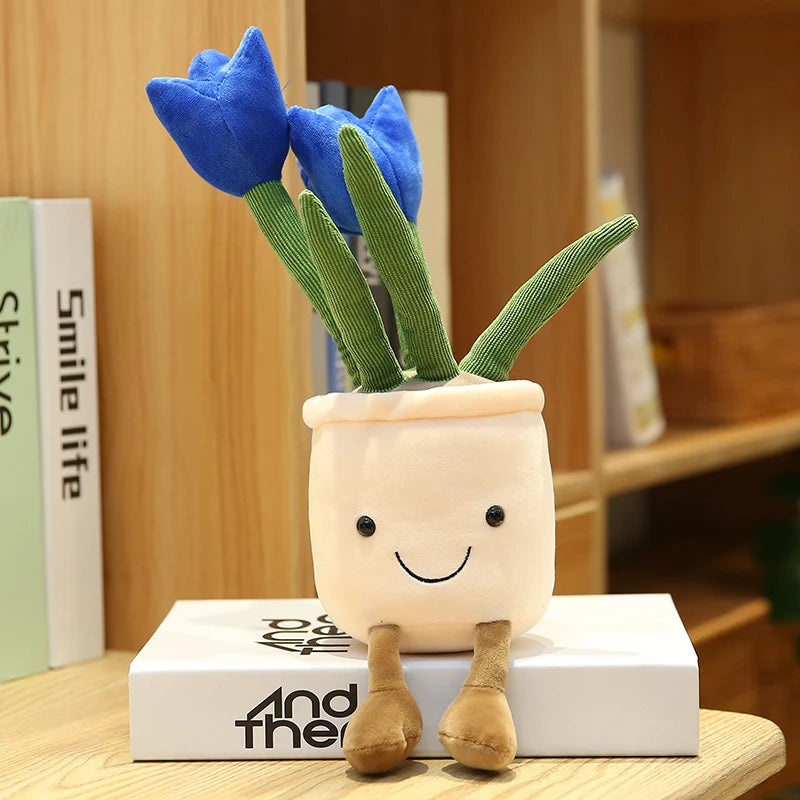 Plush kawaii toy flowerpot with blue flowers on a wooden surface