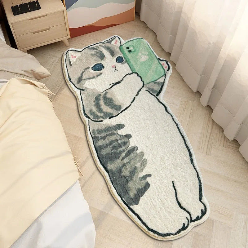 A cat rug holding up a mobile phone lies on a wooden floor 