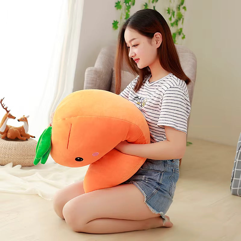 Woman holding a large orange kawaii plush toy in a cozy room.