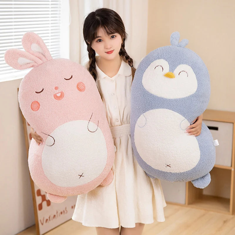 Woman holding a pink rabbit kawaii plush toy and a blue penguin plush toy in a room.