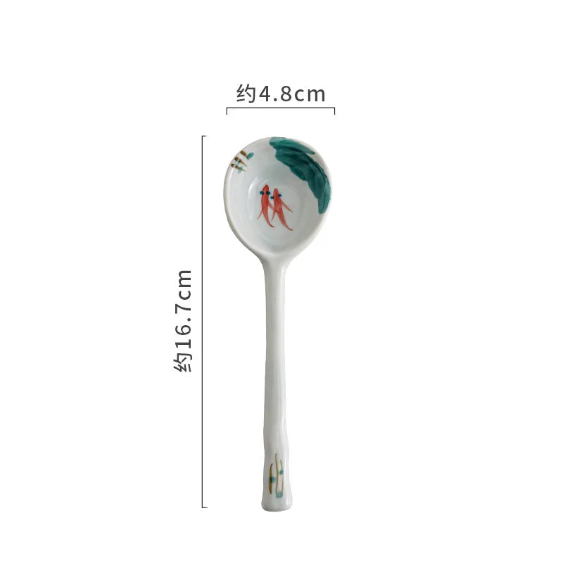 Kawaii spoon with decorative design on a white background, showing measurements.