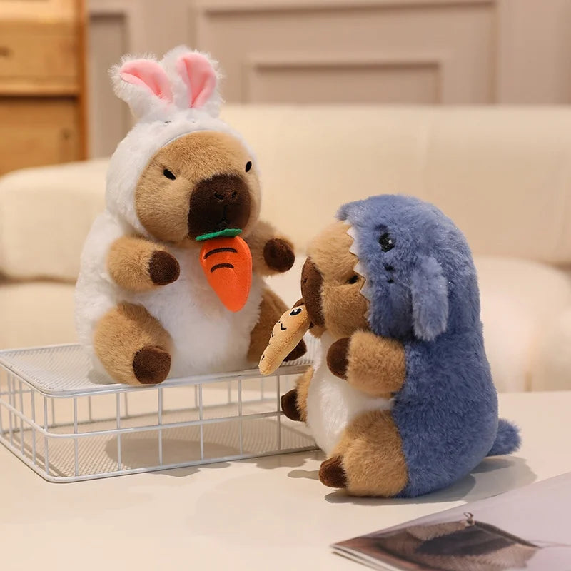 Two kawaii plush toys, one resembling a rabbit and the other a dog, sitting on a table with a carrot between them.