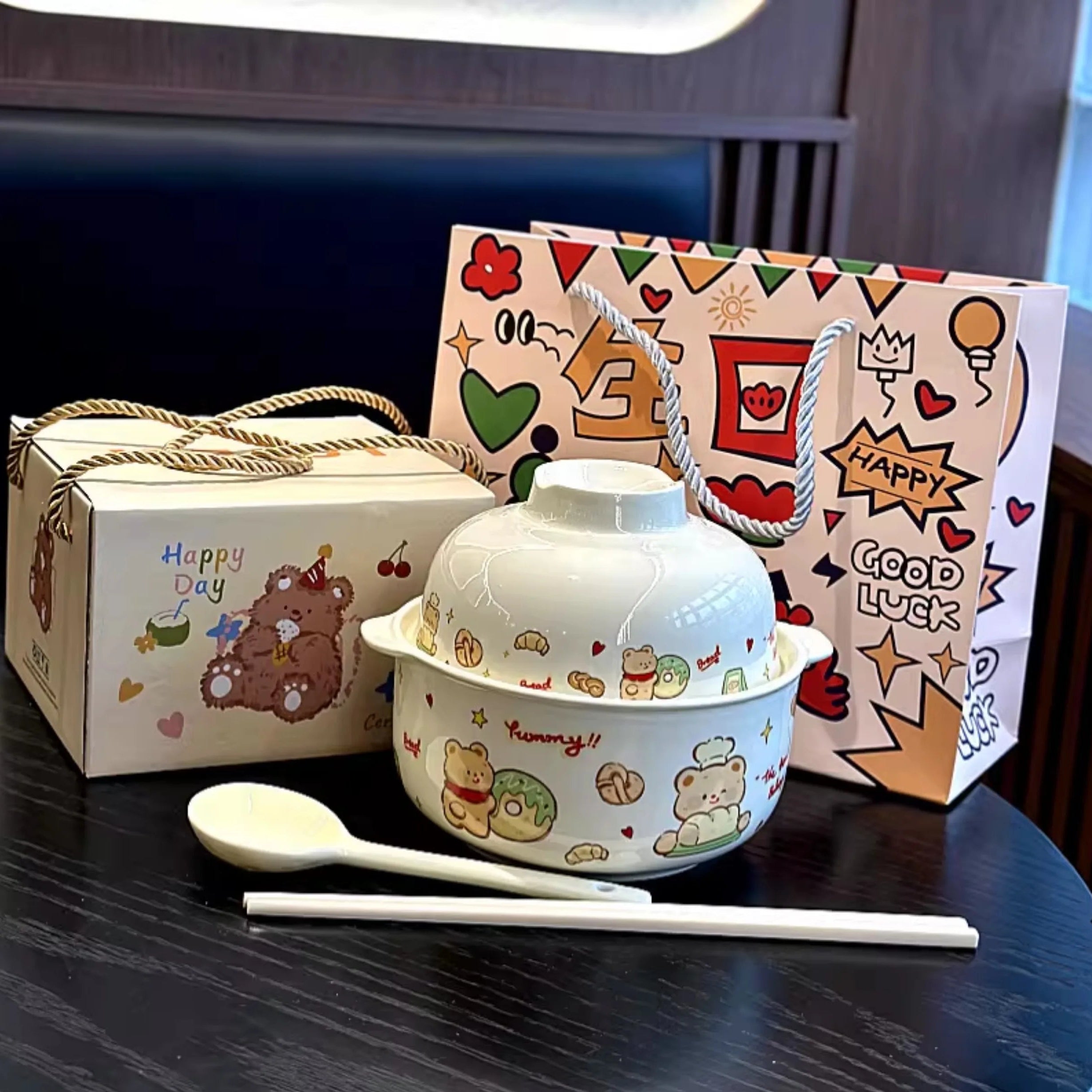 A cartoon themed kawaii ramen bowl set with spoon