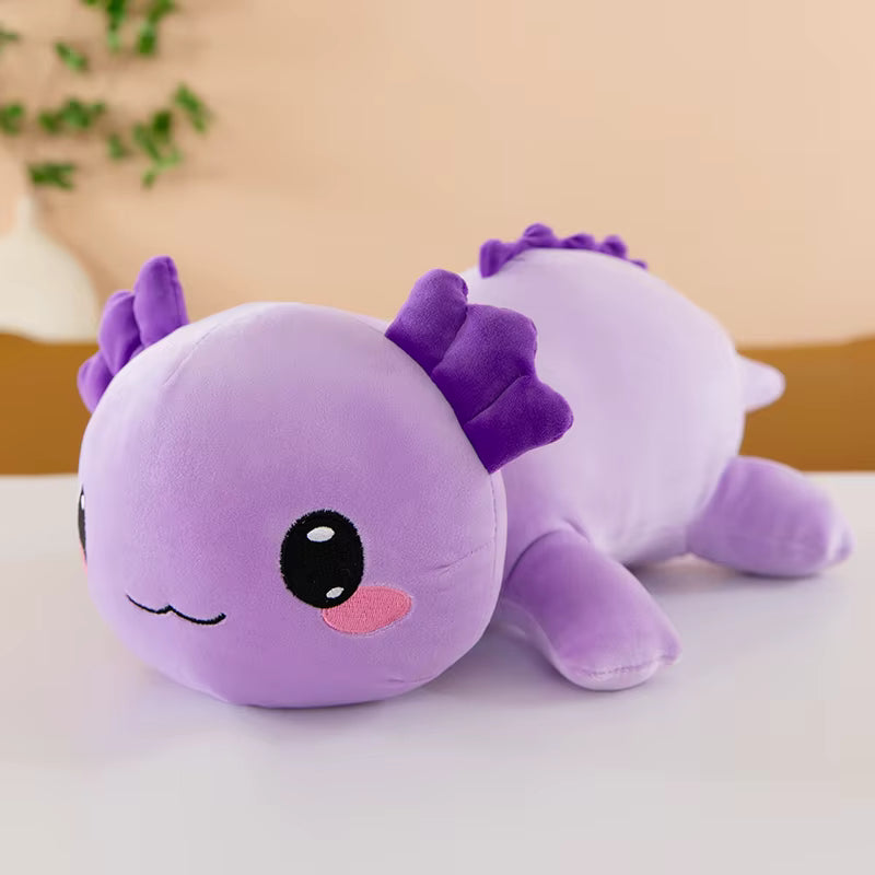 Purple plush toy with a cute face on a white surface