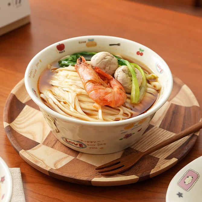 Kawaii ramen bowls of noodles with shrimp and vegetables on a wooden table