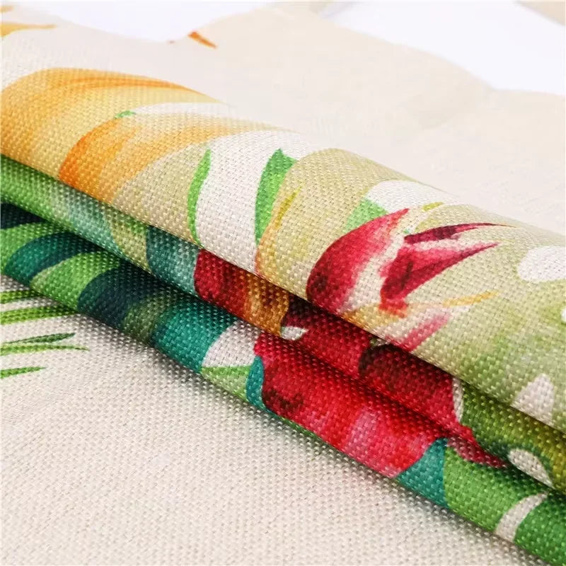 Close-up of floral kawaii apron fabric with a tropical design on a white background