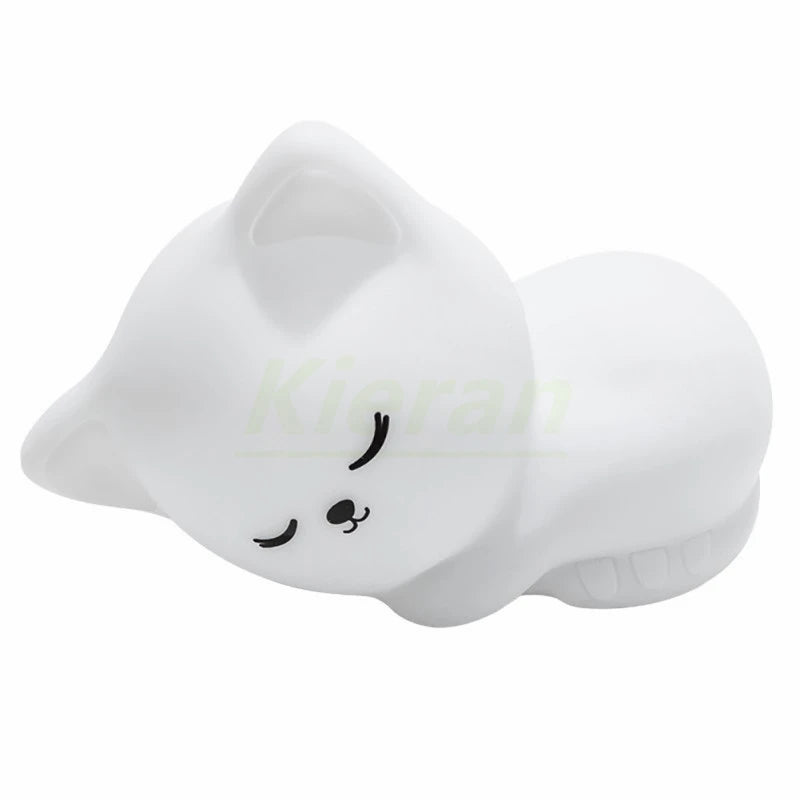 White kawaii mouse-shaped object with black facial features on a white background