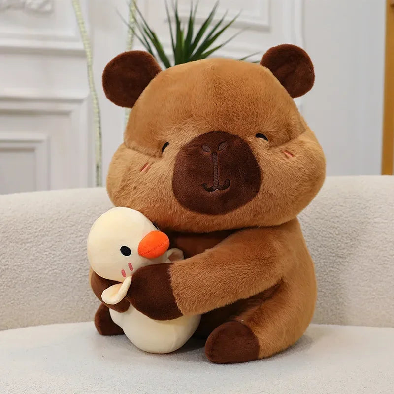 Large kawaii plush bear hugging a smaller plush snowman on a light-colored surface.