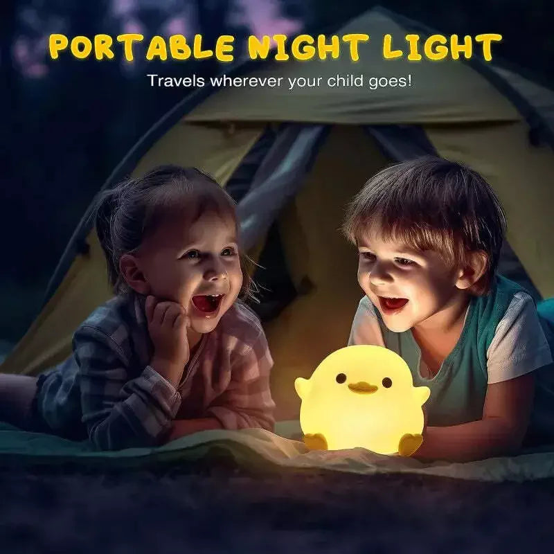 Two children with a yellow kawaii night light in front of a tent, with text 'Portable Night Light' and 'Travels wherever your child goes!'.