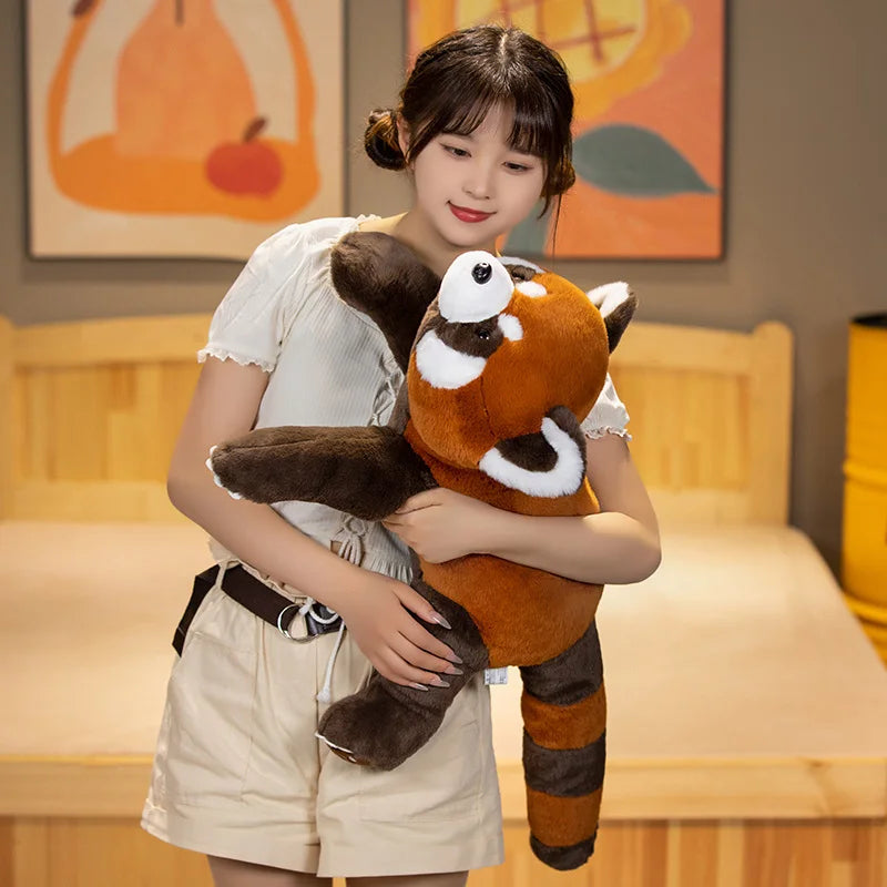 Young girl holding a kawaii plush red panda toy in a room with orange and yellow decorations.