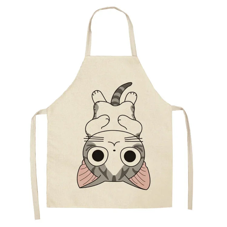 Beige kawaii apron with a cat-themed design on a white background
