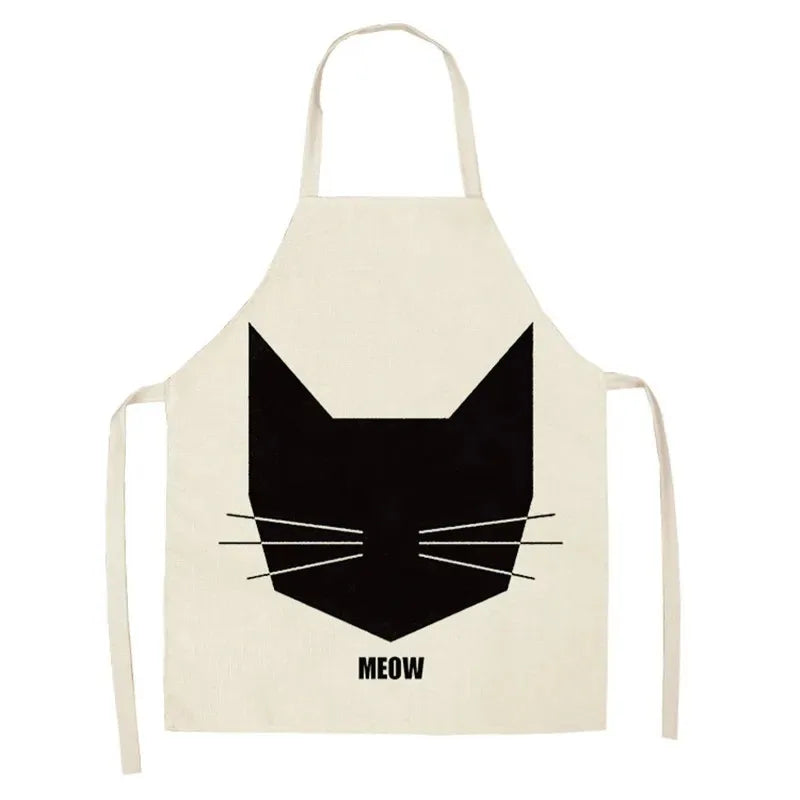 Beige Kawaii apron with a black cat face design and 'MEOW' text on a white background