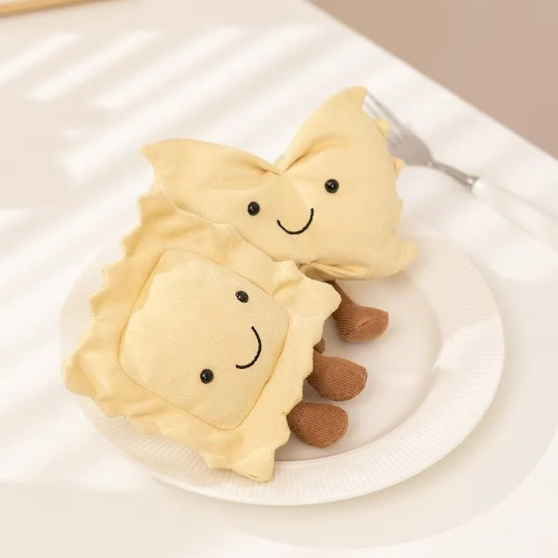 Two cute kawaii plush toy resembling a cloud with a smiling face on a white plate.
