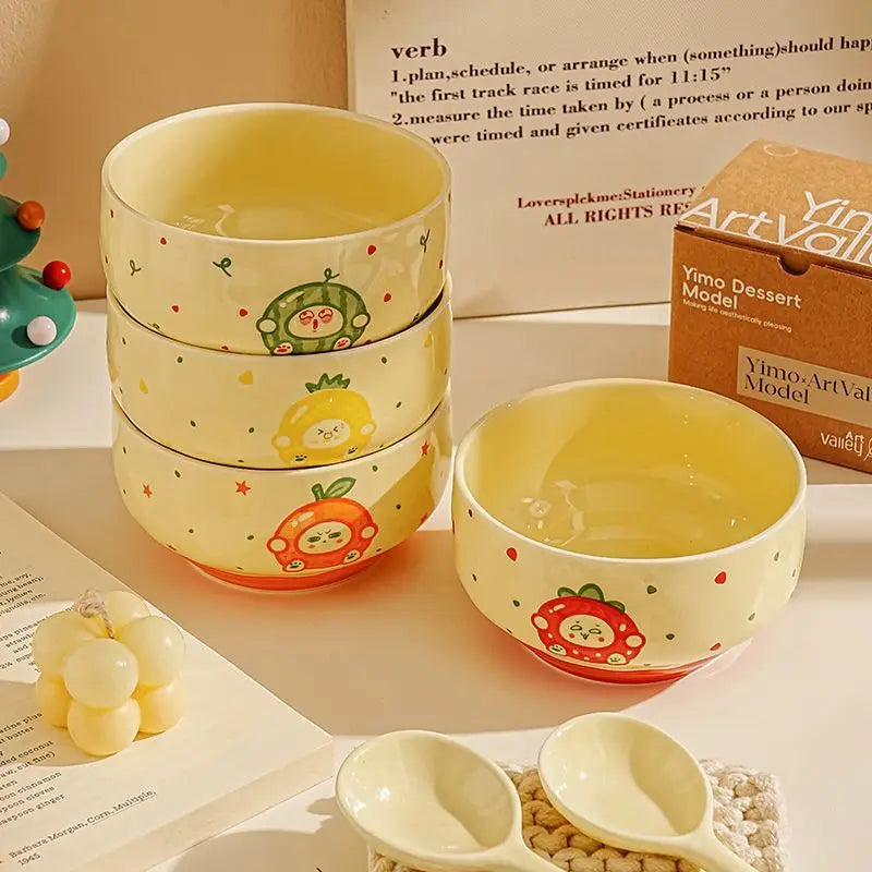 A set of kawaii bowls stacked on a table