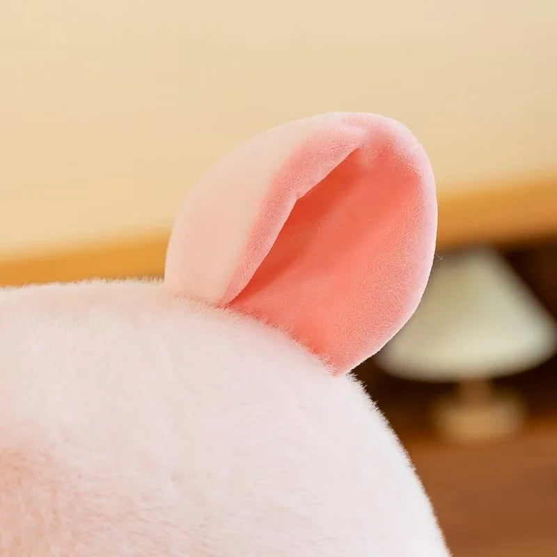 Close-up of a pink kawaii plush toy with a blurred background