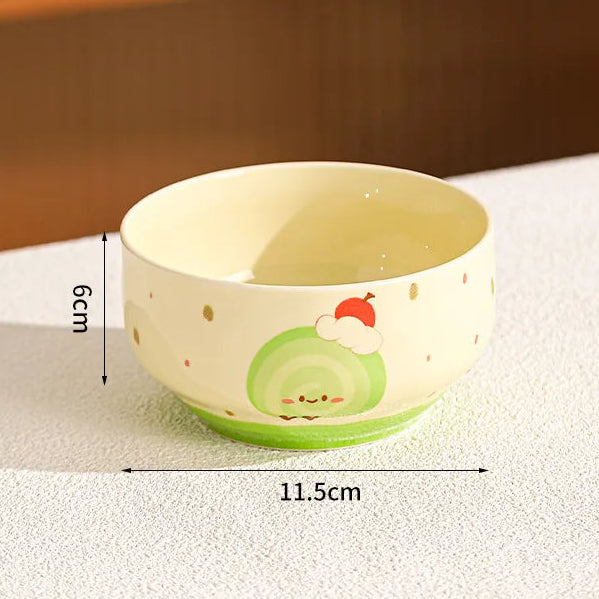 Small ceramic kawaii bowl with cartoon design on a textured surface, showing dimensions.