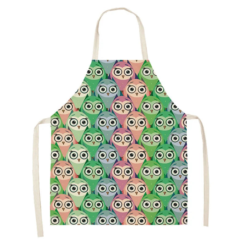 Colorful owl patterned kawaii apron on a white background