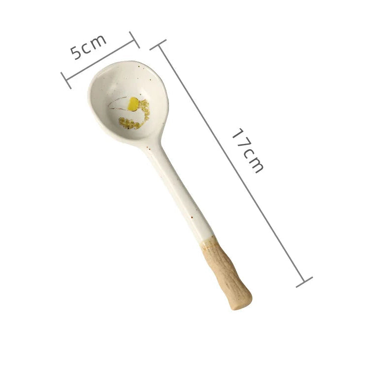 A white ceramic kawaii spoon with measurements