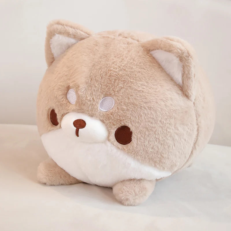 Plush kawaii toy resembling a cute animal on a light background