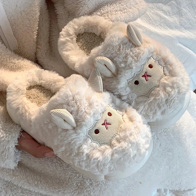 Pair of kawaii fluffy white slippers with decorative elements on a soft surface
